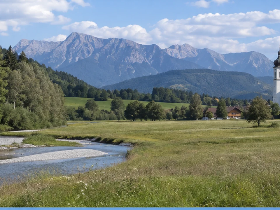 Schöllang: Illerwiesen und Kirchturm vor der Hörnergruppe